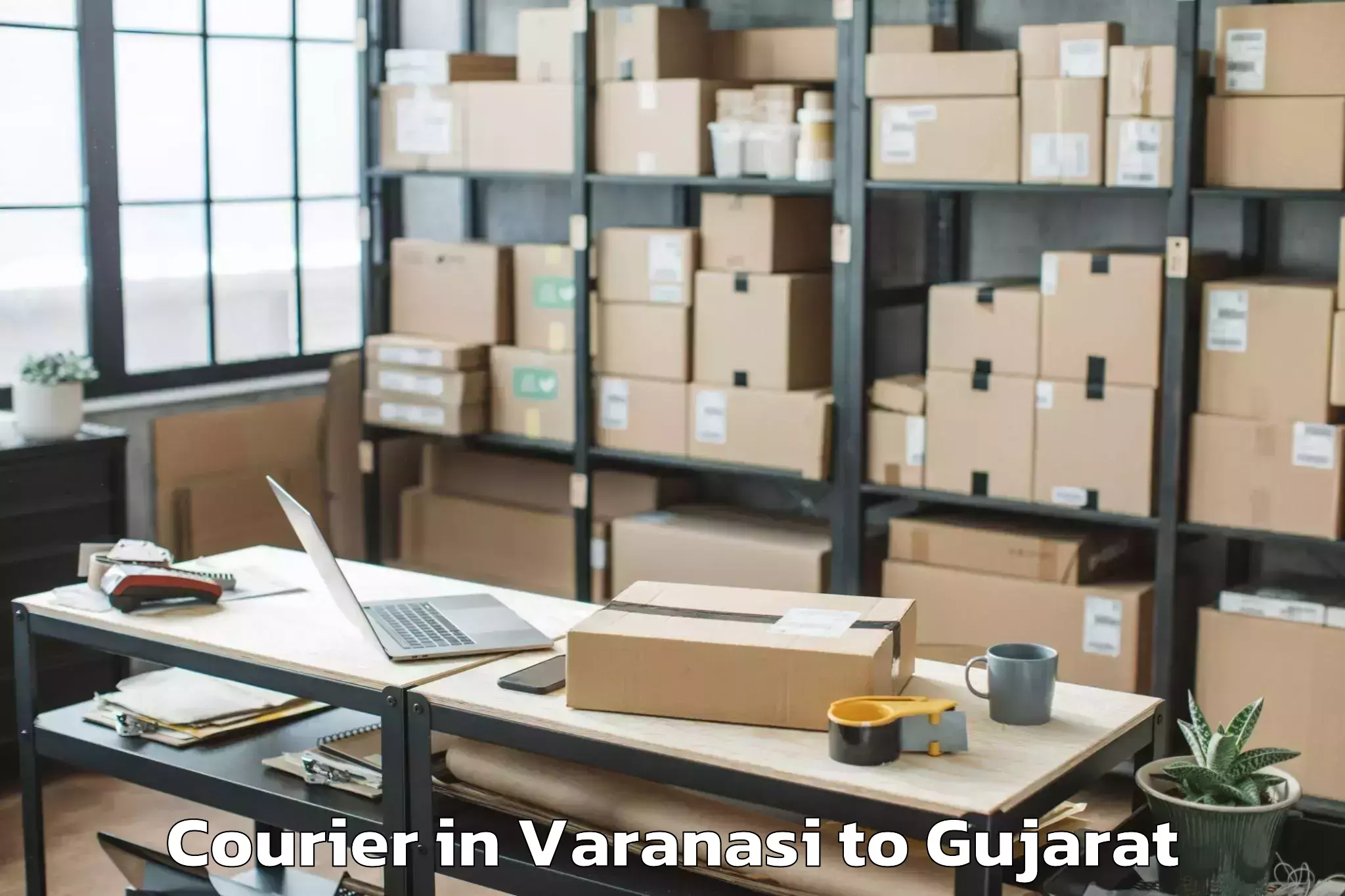 Get Varanasi to Jamkandorna Courier